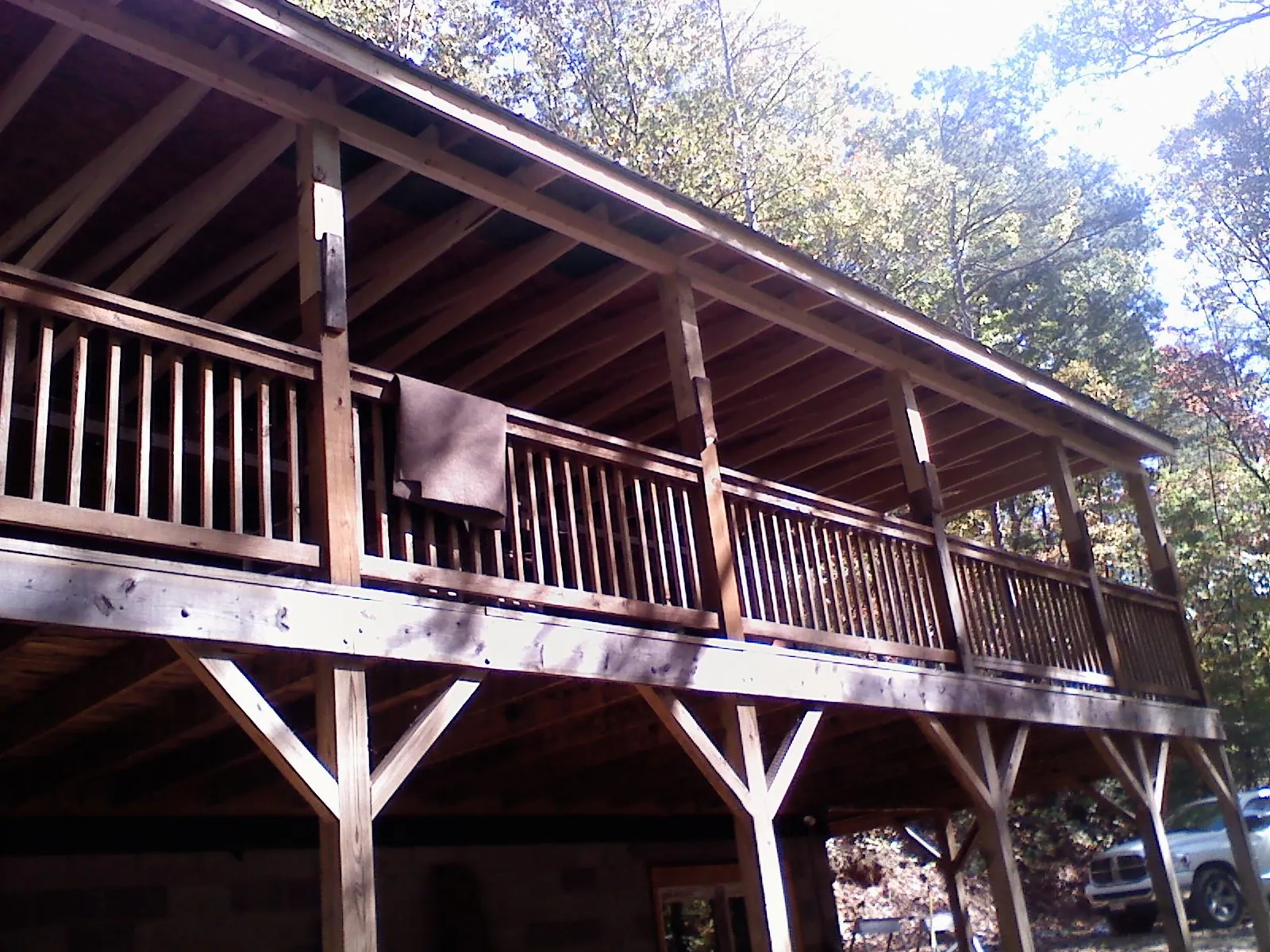 Timber framing under a new elevated porch and deck — Roof Leak Repair in Alcalde by Roofing Brothers
